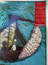 Load image into Gallery viewer, Artistic embroidered depiction of a ship with an alien and an aboriginal man on a textured fabric surface.
